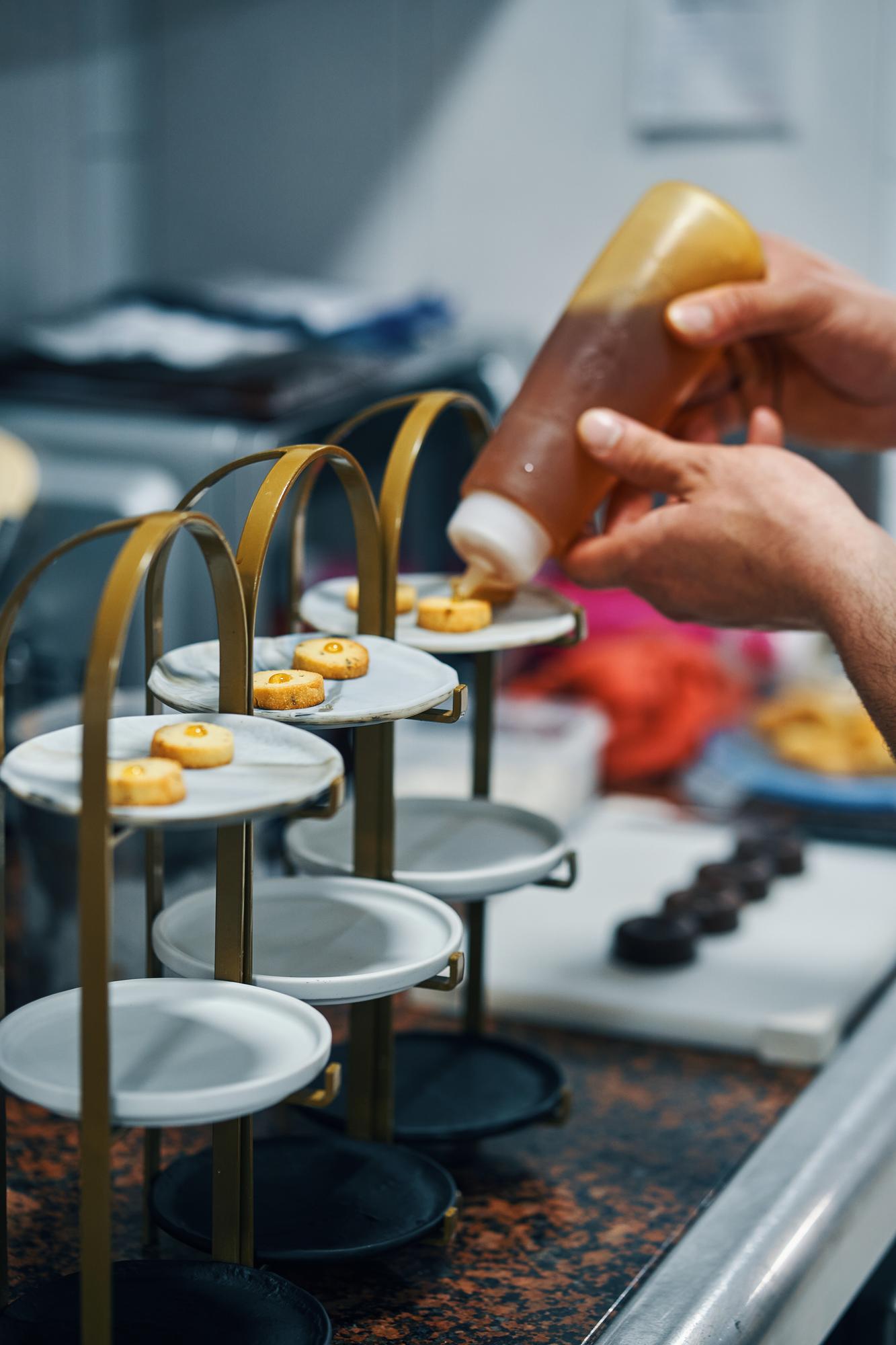Contemporary culinary workspace with tools and plated dishes