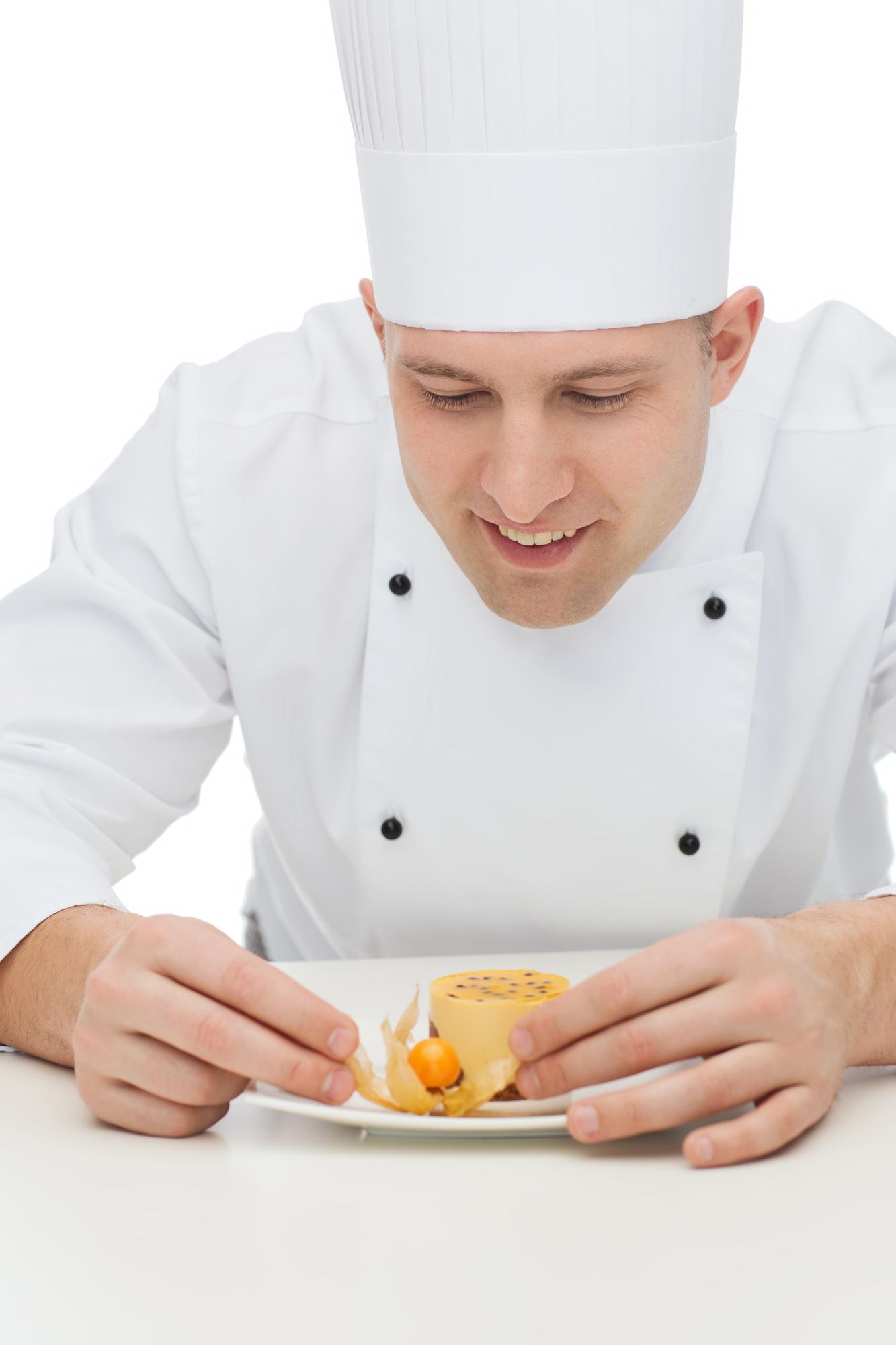 Instructor demonstrating plating technique to students