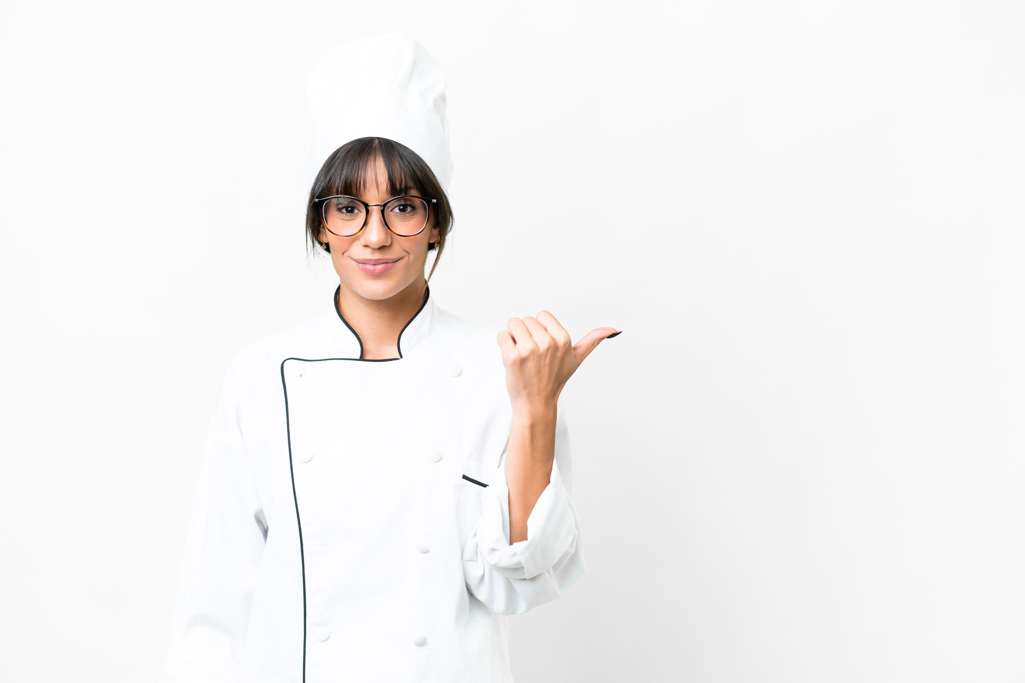 Chef teaching a small group in modern kitchen